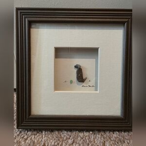 Framed Dog Madfe With Pebbles And Sea Gladd with Brown Frame